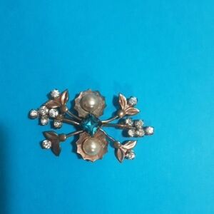 Elegant Gold and Rhinestone Brooch with Blue And Faux Pearl Accent